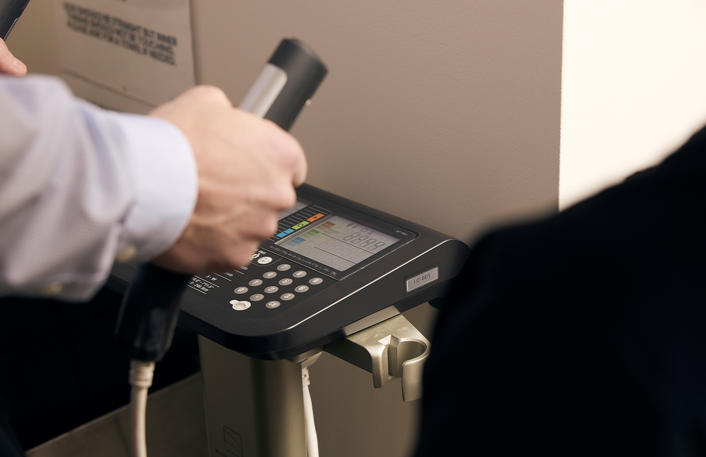 Photo of patient using a medical machine
