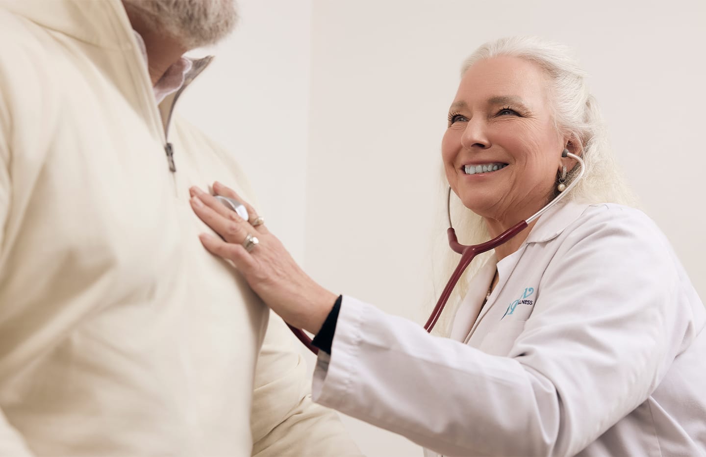 Doctor listens to heart rate stethoscope