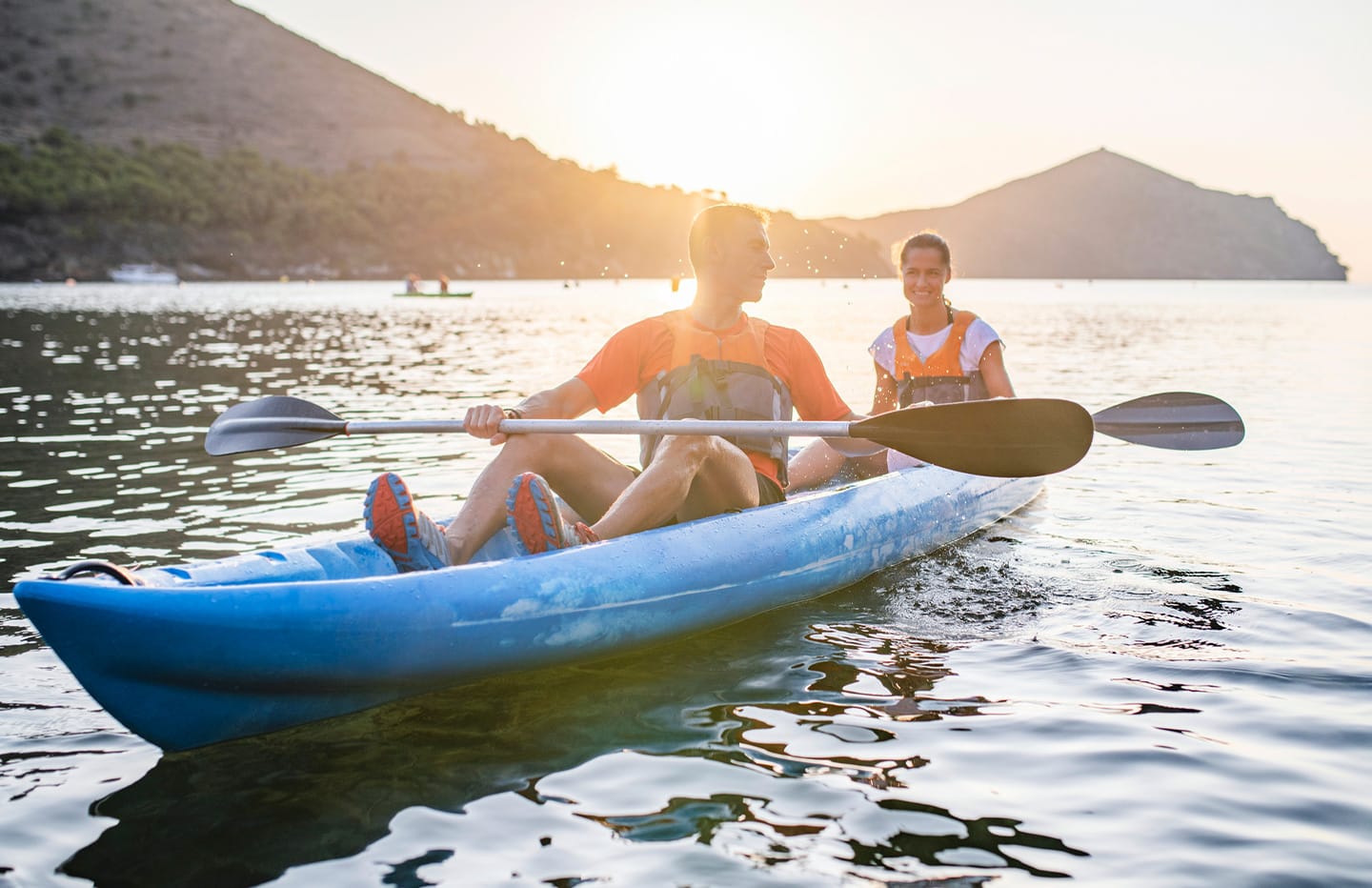 Man and woman canoeing
