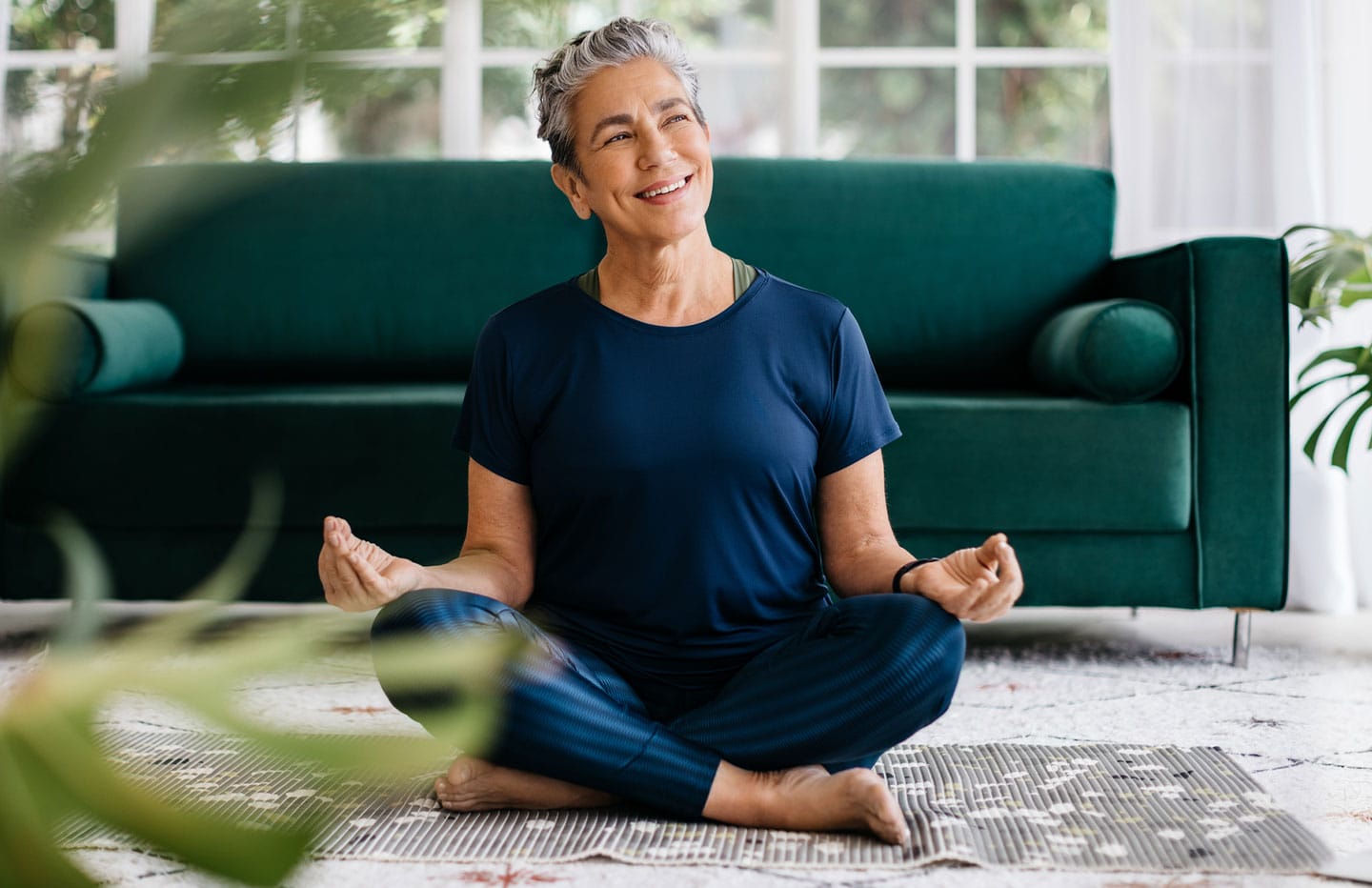 Woman meditating smiling