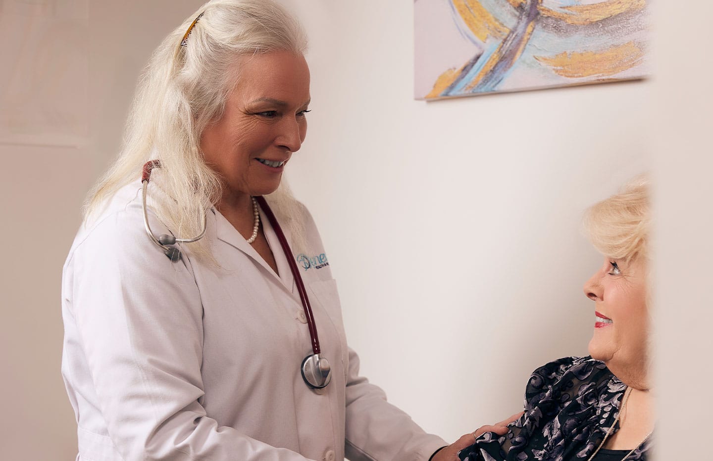 Female doctor in room with female client during consultation for semaglutide in Nashville
