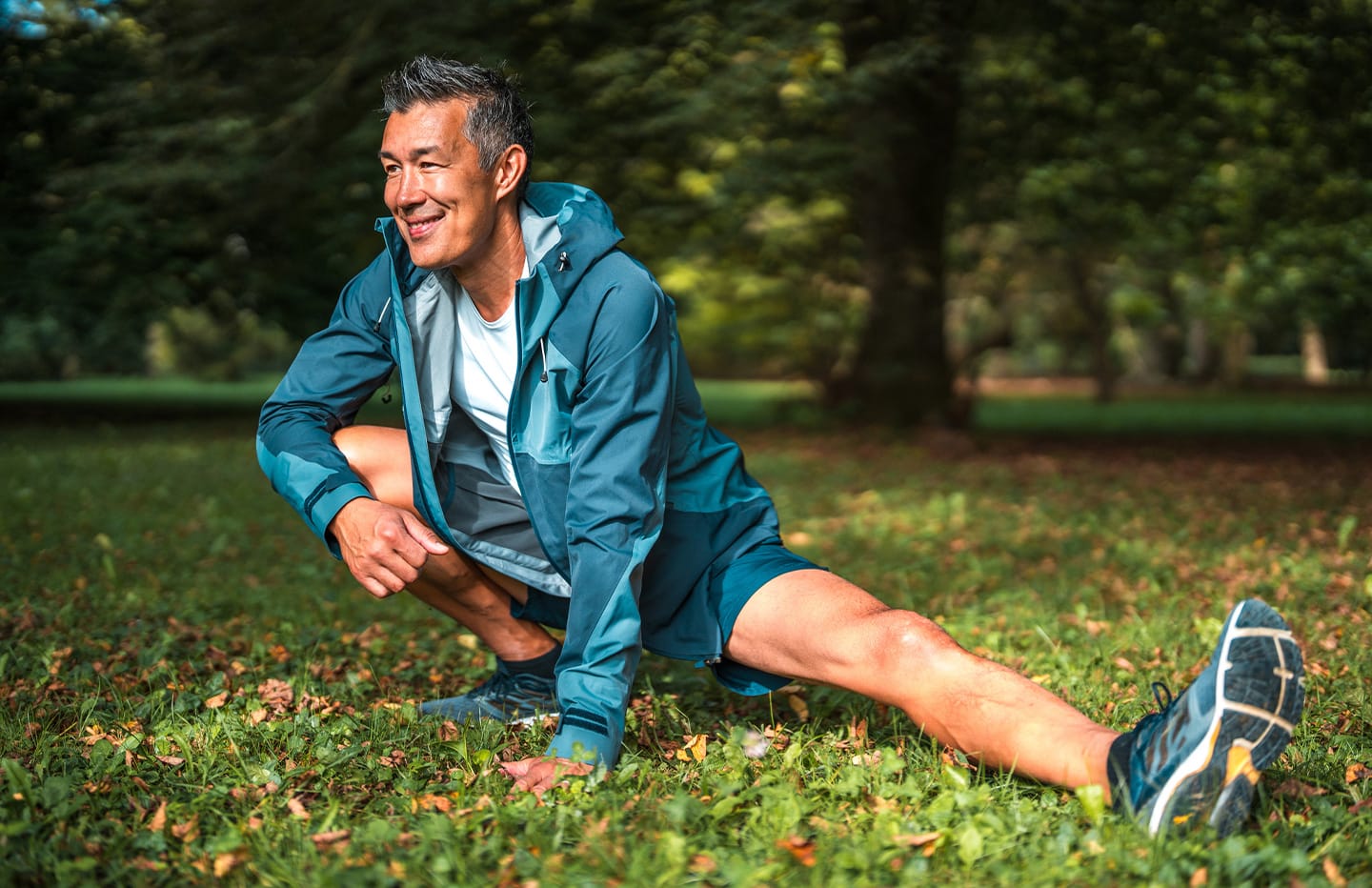 Man stretching and smiling