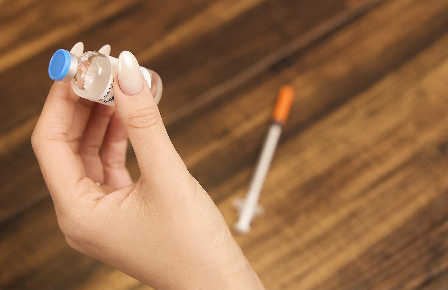 Bottle of treatment and needle